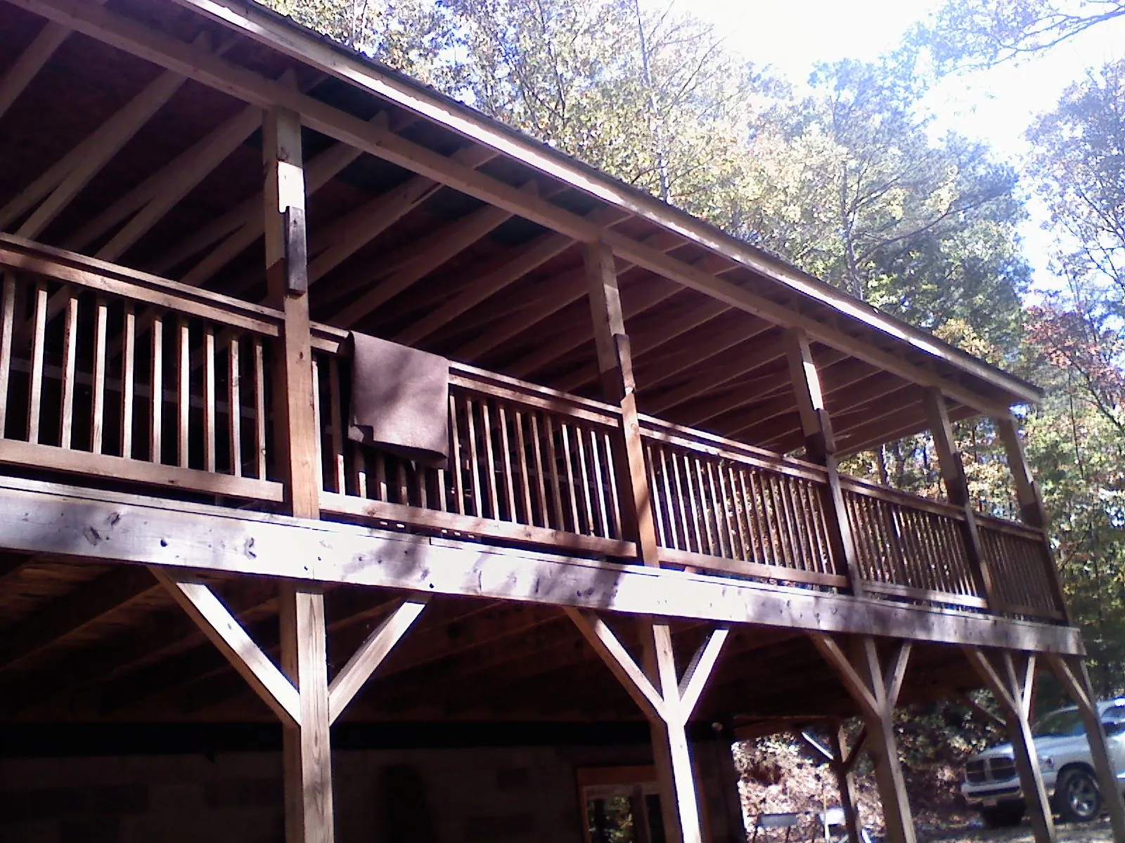 Timber framing under a new elevated porch and deck — Roof Leak Repair in Juneau by Roofing Brothers